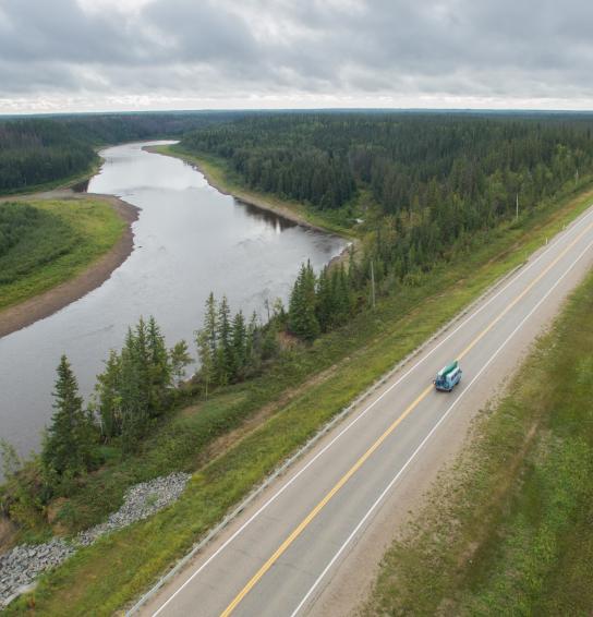 Overhead of van going down the highway
