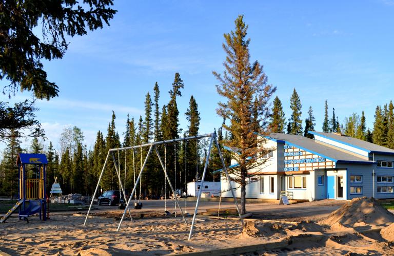 60th Parallel Campground VIC building and park playground